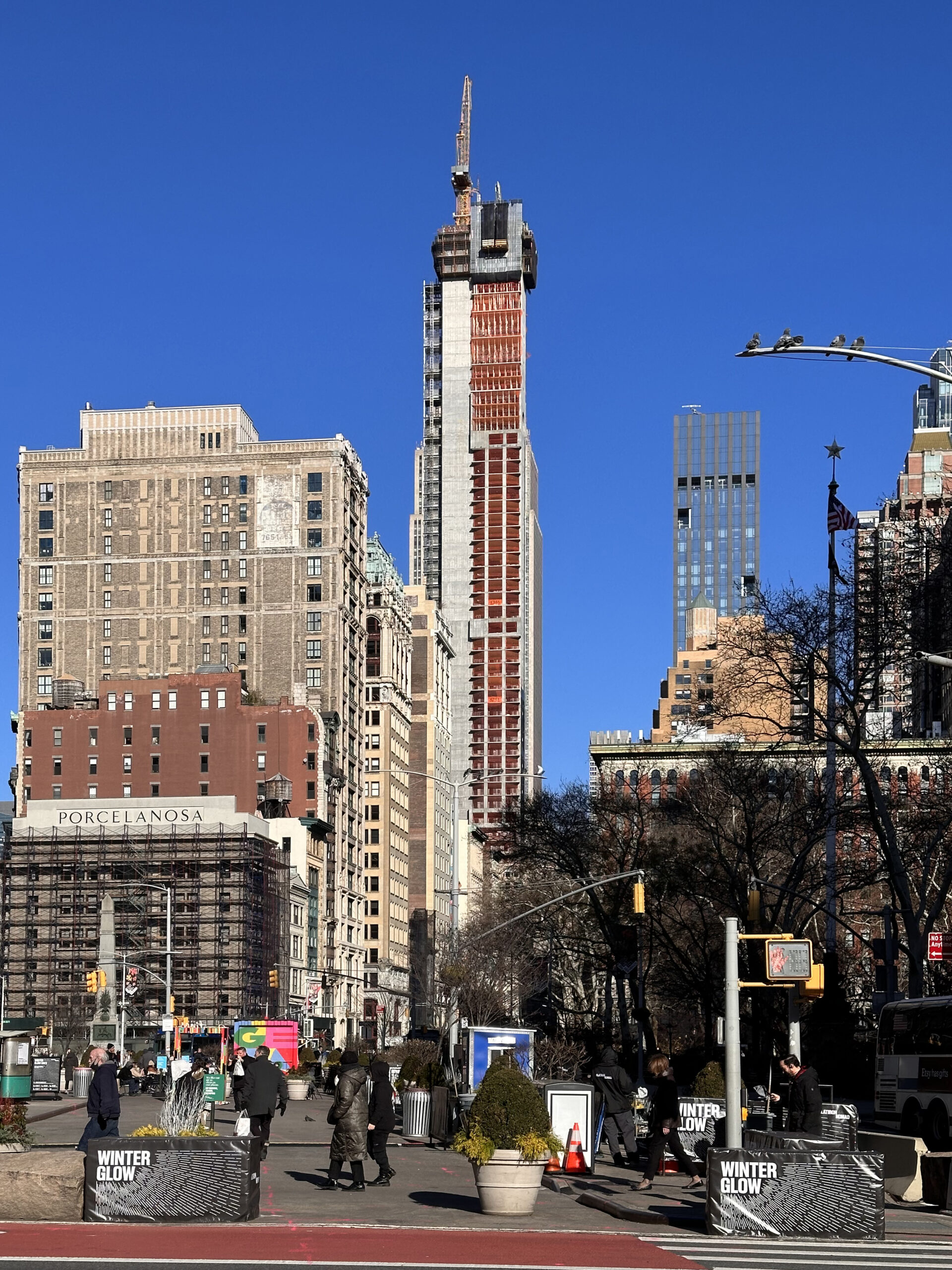 262 Fifth Avenue towering over Manhattan skyline, blocking Empire State Building views